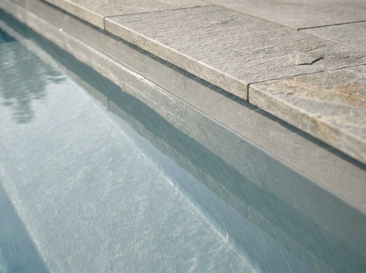 Probuilt Renovations crew at a Kansas City residential pool, warm daylight, local presence